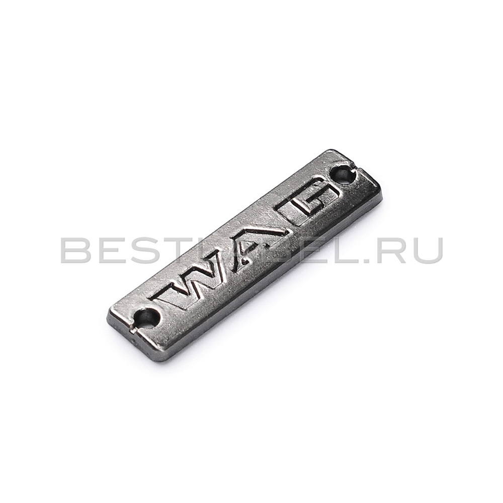 Плоская металлическая этикетка с надписью WAG